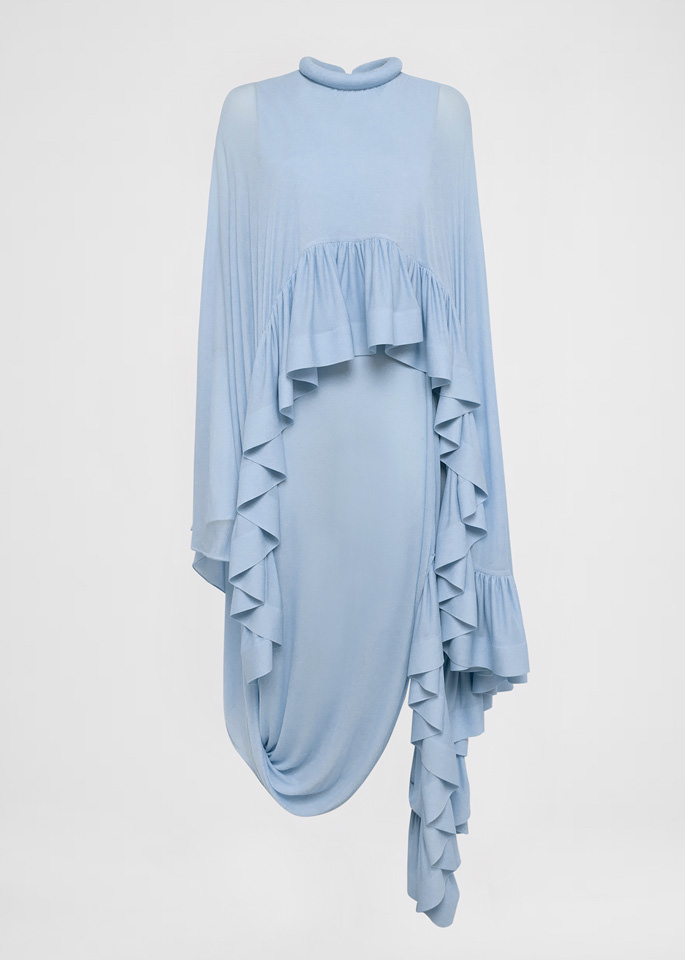 DEL CORE: CAPE DRAPED JERSEY CREPE DRESS WITHASYMMETRICAL SPLIT AND RUFFLES